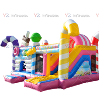 Château gonflable commercial haut de gamme en PVC robuste avec toboggan combiné, trampoline à bungee et structure gonflable de type « Candy Park »