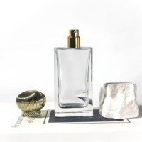 Bouteilles de parfum uniques bocaux en verre avec couvercles bouteille d'huile d'olive vide clair parfum atomiseur bouteille de parfum en verre 100ml