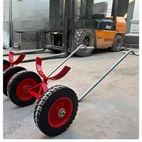 Chariot de manutention de tuyaux d'incendie robuste avec fourches rotatives à 360 degrés et pneus épaissis antidérapants pour chantier de construction