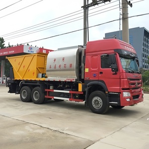รถบรรทุก HOWO 6x4 สำหรับขนหินแบบซิงโครนัส ขนาด 20 ลูกบาศก์เมตร พร้อมเครื่องจ่ายยางมะตอย ระบบไฮดรอลิกเต็มรูปแบบ สำหรับพ่นยางมะตอยและหิน - Product Image 1