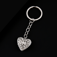Ywyougang Ensemble de porte-clés avec médaillon cœur creux, 4 couleurs, porte-clés en métal avec insert photo, pendentif cœur, chaîne pour breloque de sac, cadeau