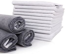 Lot de 40 tapis d'apprentissage pour chiots avec bande adhésive 24x24 - Grands tapis d'apprentissage pour chiens au charbon de bois, tapis absorbants anti-odeurs - Product Image 4