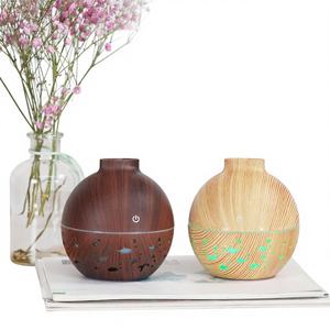 Difusor de Aroma Creativo con Diseño de Madera YX-010Y, Humidificador USB de 130 ml con Luz Nocturna, Regalo para el Hogar - Product Image 1