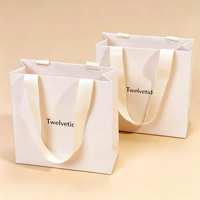 Sacs en papier cartonnés personnalisés avec logo imprimé, sacs de shopping en papier, emballages de luxe pour vêtements, sacs cadeaux