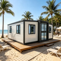 Maison conteneur préfabriquée de 20 pieds, deux chambres, maison modulaire à panneaux sandwich, système d'énergie solaire pour villa ou atelier