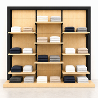 Étagère murale en bois à 3 colonnes décalées, sur mesure, pour la présentation de vêtements pliés en magasin, usage commercial