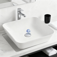 Lavabo de comptoir blanc simple lavage à la main évier de salon articles sanitaires évier de table en céramique pour hôtel appartement salle de bain