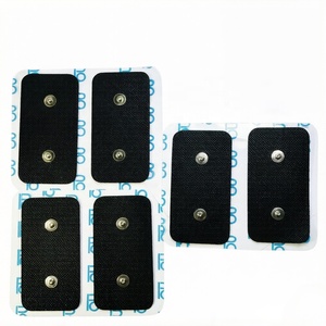 <span class=keywords><strong>Patch</strong></span> musculaire adhésif noir non tissé 5x10cm avec deux boucles métalliques pour électrodes de physiothérapie <span class=keywords><strong>Compex</strong></span> et unités de massage - Product Image 1