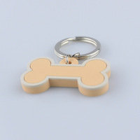 Pendentif en silicone personnalisé en forme d'os avec motifs de dessins animés, logo personnalisé, pour carte d'identité, étiquette pour animal de compagnie en silicone de qualité alimentaire, toutes saisons