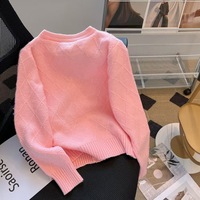 Nuevo diseño al por mayor cárdigan perla lujo bolsillo cárdigan mujeres solo pecho cuello redondo elegante mujeres suéteres