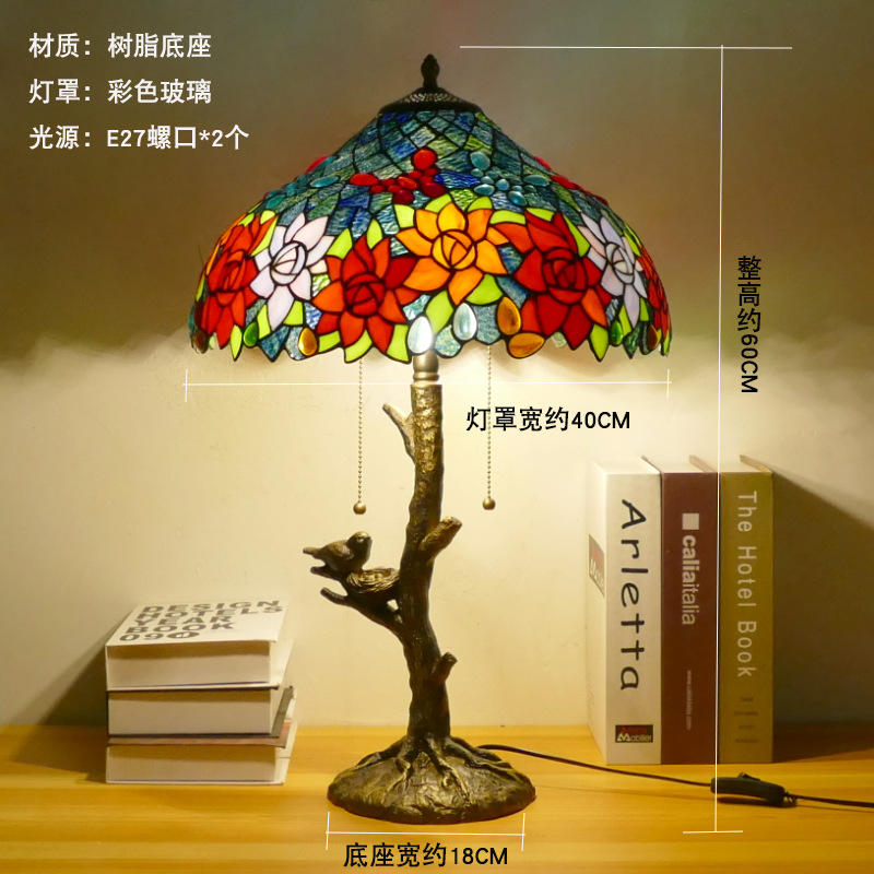 Portavelas ancho de 40cm con cuentas de mariposa y diseño floral.