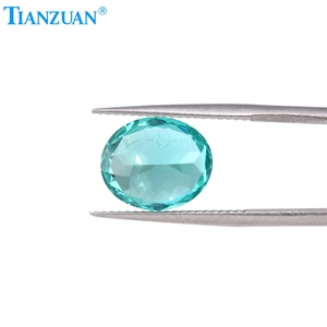 Đá quý tổng hợp YAG màu neon Paraiba hình oval, được nuôi cấy trong phòng thí nghiệm, có tạp chất, dạng đá rời - Product Image 3