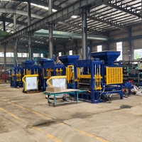 Machine automatique de fabrication de blocs de ciment QT4-15 avec moules pour pavés