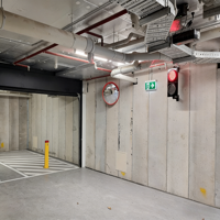 Solution de circulation pour les parkings GUANGAN avec systèmes de priorité aux véhicules et gestion de rampes pour un déplacement efficace des véhicules