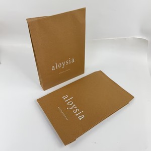 Pochette en papier kraft jaune avec logo blanc imprimé sur mesure, recyclable, pour vêtements, emballage cadeau - Product Image 5