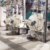 Raffineur à double disque Yunda 380V 15000 L/min, engrenage d'alimentation contrôlé par PLC, disque abrasif SS304 42-48 pouces, machine à pulper économe en énergie