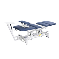 Lit de traction vertébrale électrique réglable en métal pour chiropratique, massage, décompression discale et physiothérapie