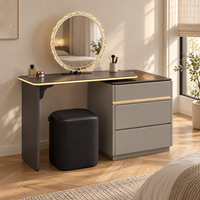 Table de toilette pour le maquillage avec miroir rond orné de pierres, panneau en verre noir, tiroirs à bordure dorée pour chambre à coucher, maison et salon de beauté