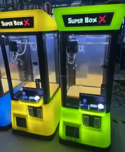 Dinibao गर्म बिक्री सिक्का संचालित खेल मशीन सुपर बॉक्स एक्स पंजा वेंडिंग खिलौना क्रेन