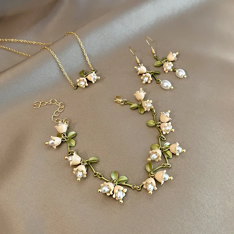 Mode fleur pendentif collier doux perle collier boucle d'oreille réglable Bracelet ensembles de bijoux femmes