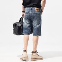 Jeans décontractés pour hommes à la mode de rue jambe large demi-pantalon bas court design baggy