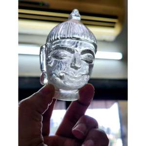 Cabeza de Buda de Cuarzo Transparente: Un Símbolo de Iluminación y Claridad Cristalina - Product Image 1