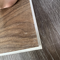 Nouvelle arrivée : Planche stratifiée SPC à grain de bois lisse avec service de découpe, imperméable et ignifuge pour armoire de cuisine