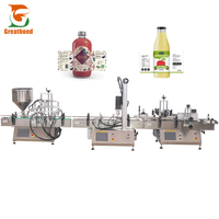 Ligne de production alimentaire multifonctionnelle Machine de remplissage d'étiquettes de capsulage de bureau pour bouteilles rondes de sauces et de boissons liquides