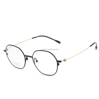 Montura de gafas ópticas redondas de titanio unisex, monturas de gafas graduadas ligeras a la moda