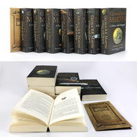 Littérature pour l'adolescence : Ensemble de 7 romans de la série Game of Thrones de George R.R. Martin, édition complète, reliure souple en fil de papier léger