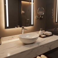 Vasque en céramique ovale de petite taille à surface lisse moderne pour salle de bain et hôtel, vente en gros