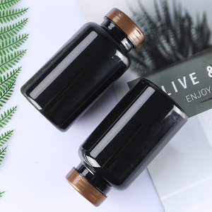 ขวดพลาสติก PET สีดำทรงกลม ขนาด 300 มล. ขึ้นรูปด้วยวิธีการเป่าขึ้นรูป บรรจุภัณฑ์แบบปิดผนึก ฝาเปิดปิดแบบพลิก สำหรับผลิตภัณฑ์เพื่อสุขภาพและยา - Product Image 2