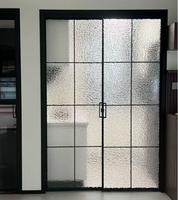 Ventanas de calidad superior Marco negro de acero Puerta abatible de doble vidrio Puerta francesa de acero frontal con rejilla