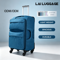 Valise de voyage élégante et spacieuse en tissu Oxford bleu, idéale pour les affaires et les déplacements