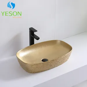 Yeson sanitary ware bathroom artistic golden color luxury porcelain sink gold ceramic hand wash basin bowl