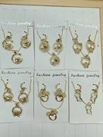 Conjunto de Pulsera de Oro al por Mayor con Colgante de Corazón de Hello Kitty y Aretes de Cristal