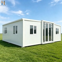 Maison conteneur de luxe extensible 20ft 40ft, préfabriquée, moderne, portable, pour bureau, hôpital, villa, avec design respirant pour un confort optimal