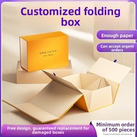 Boîte cadeau rigide pliable haut de gamme personnalisée en forme de livre avec fermeture magnétique, impression UV/estampage à chaud, poignée et ruban, accessoires inclus