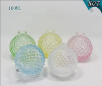 Huile essentielle de bouteille en verre de forme d'ananas de la conception unique 100ml pour le diffuseur pour l'emballage cosmétique avec la couleur adaptée aux besoins du client