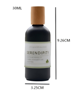Flacon diffuseur en verre noir mat avec couvercle en bois naturel, étiquette personnalisée, forme cylindrique, impression sérigraphique, huile essentielle, cosmétique