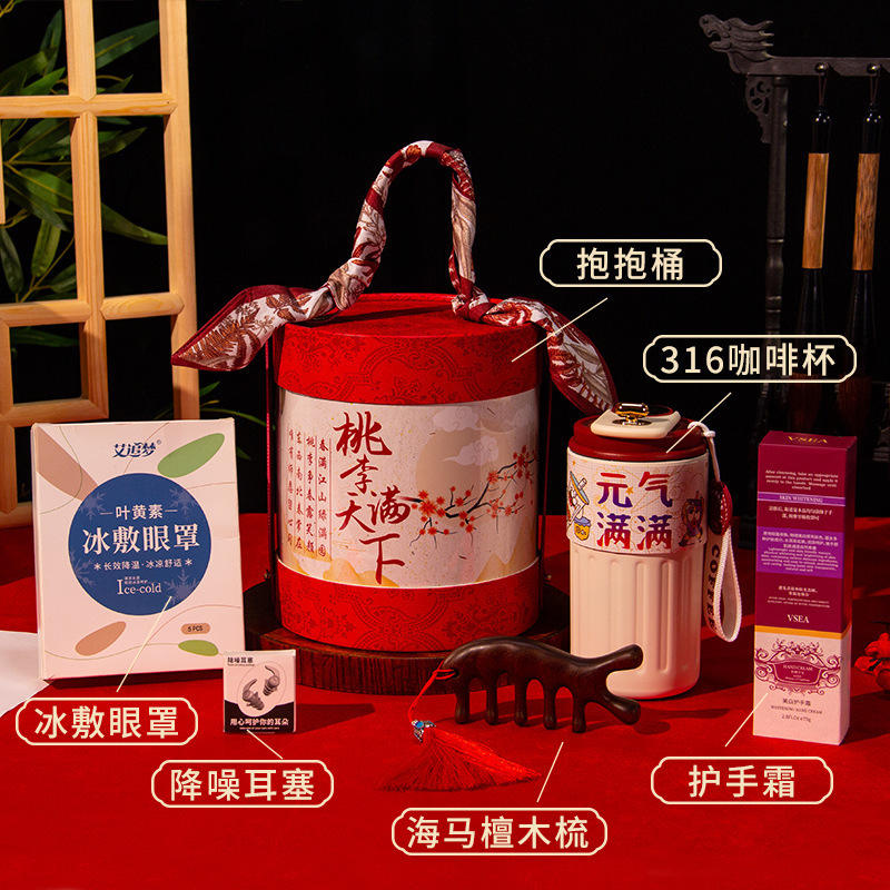 Coffee cup, sandalwood comb, ice pack, eye mask, hand cream, noise-canceling earplugs, and a hugging bucket.