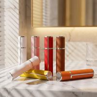 Nouvelle bouteille de parfum vaporisateur à pompe 5ml 10ml, cylindre recouvert de cuir PU, coque en aluminium, finition argentée, luxe, voyage, personnalisable