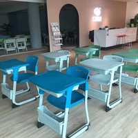 Bureau d'école durable à siège unique et à hauteur réglable avec 1 tiroir et chaise en plastique moderne pour les étudiants.