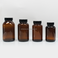 100ml 200ml 250ml rond ambre pilule capsule de qualité alimentaire comprimés bouteille en verre avec bouchon à vis noir pour enfants