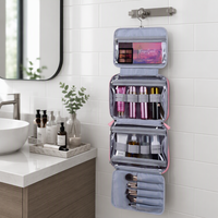 Sac de voyage suspendu multi-compartiments pour cosmétiques, organiseur de toilette avec crochet, porte-brosse et poches transparentes, étui de rangement pour maquillage