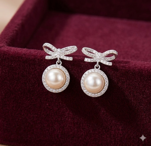 Boucles d'oreilles pendantes raffinées et élégantes, en argent sterling, avec un nœud charmant, pour femmes, mariages et rendez-vous galants - Product Image 1