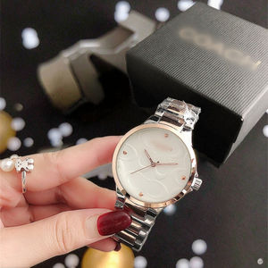 Montre-bracelet en alliage de Genève pour femmes Bracelet en acier inoxydable Montre transfrontalière Fourniture Mode Performance Quartz Montre à breloques pour femmes - Product Image 3