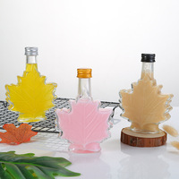 Bouteille en verre en forme de feuille d'érable 50ML 100ML 250ML pour sirop d'érable, mini bouteille transparente pour spiritueux, vodka, whisky avec bouchon à vis