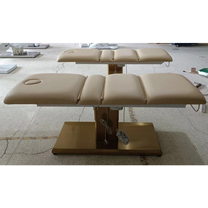 Fabricante Kisen, Venta al por Mayor de Muebles para Salón de Belleza y Spa, Cama de Masaje de Cuero Sintético con Base Dorada de Aluminio, Mesa de Masaje con Rodillos en Venta - Product Image 1