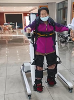Robot de rééducation de l'exosquelette des membres inférieurs assisté debout et marche système d'entraînement de la marche de l'exosquelette des membres inférieurs